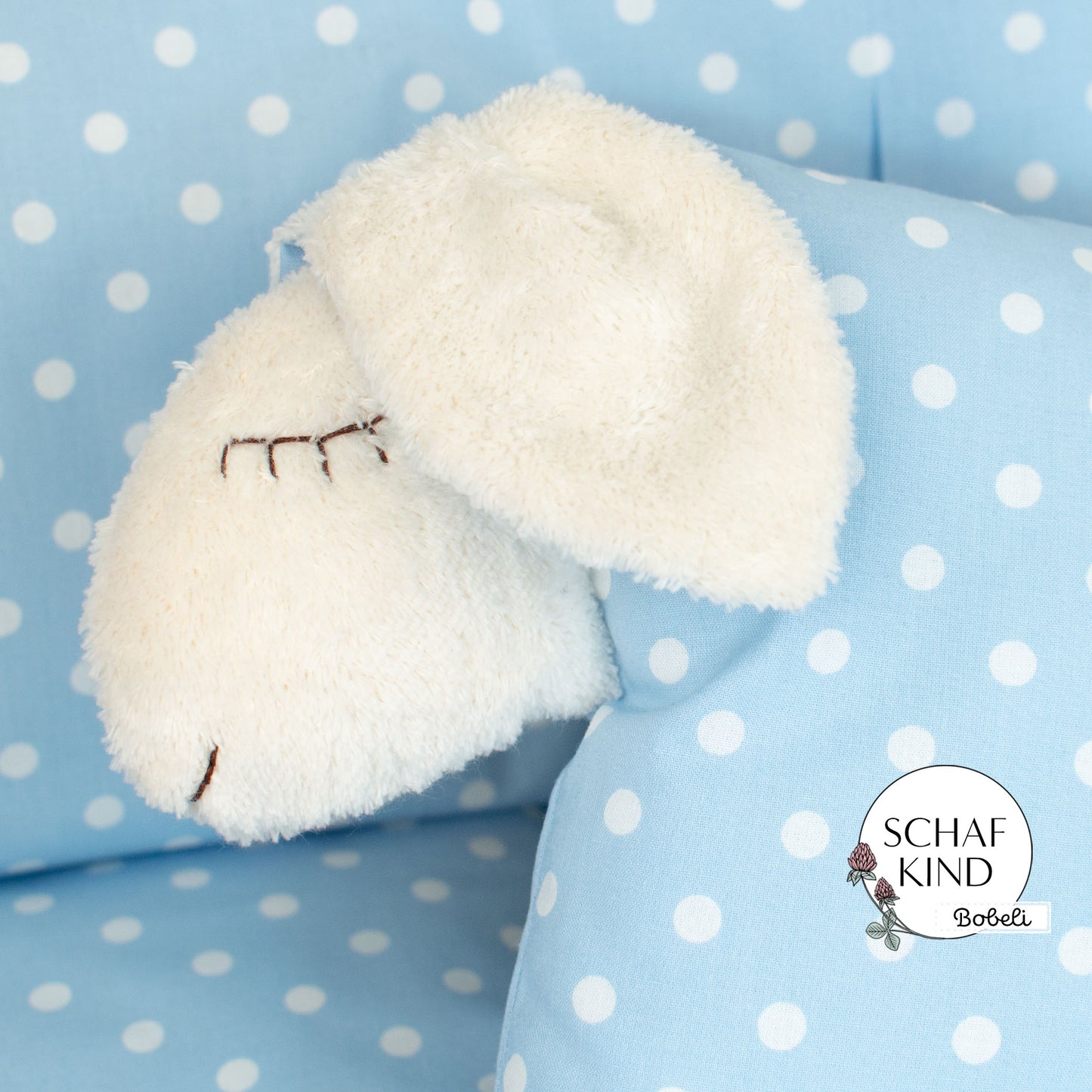 Schlafschaf 47 Hellblau mit Punkten - Bobeli Kuschelkissen