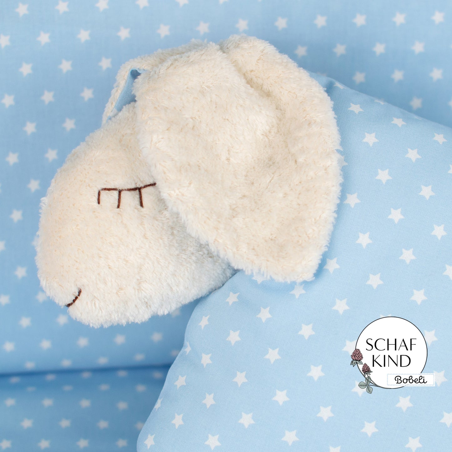 Schlafschaf 45 Hellblau mit Sternchen - Bobeli Kuschelkissen